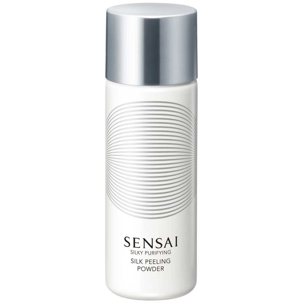 Gümüş kapaklı desenli beyaz Sensai ipek peeling pudrası şişesi