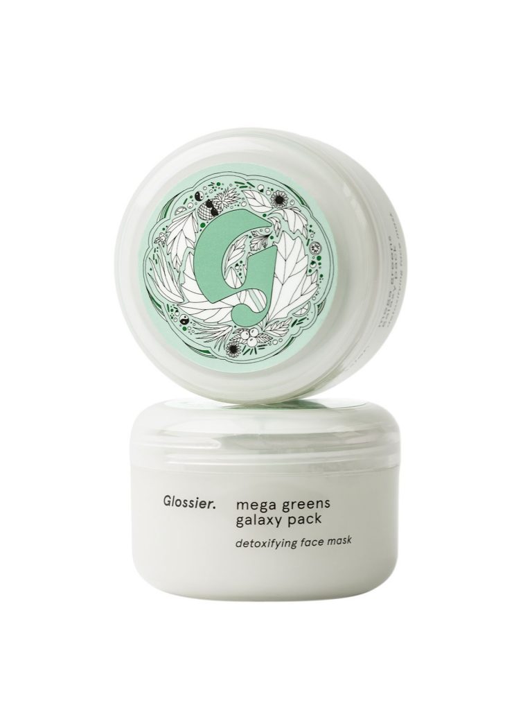 Üst üste duran iki Glossier Mega Greens Galaxy Pack maske kavanozu
