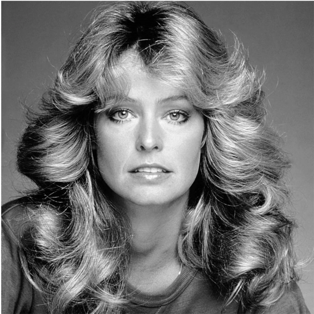 Farrah Fawcett'ın ikonik saçlarıyla siyah beyaz yakın portresi