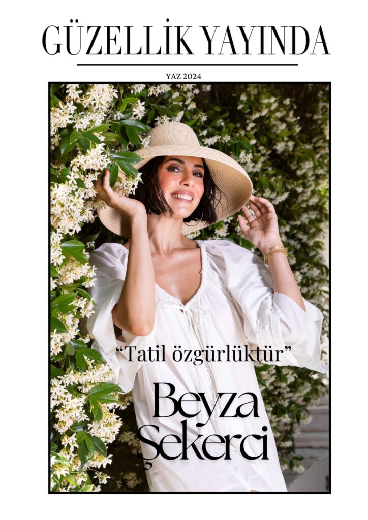 Beyaz şapkalı Beyza Şekerci çiçekler arasında gülümserken dergi kapağı